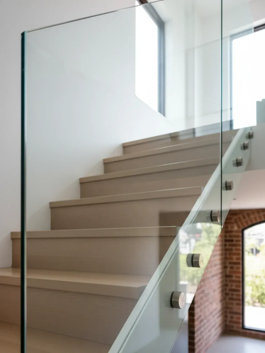 Pin fixed glass balustrade Hamilton with stainless standoffs for floating glass effect